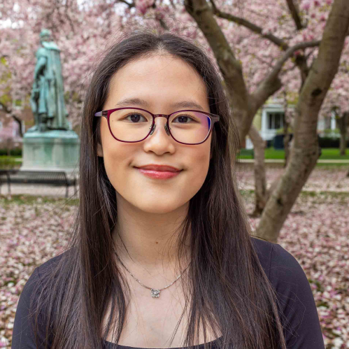 Rutgers-New Brunswick senior Amelia Khoo smiles for the camera at Voorhees Mall on the College Avenue campus.