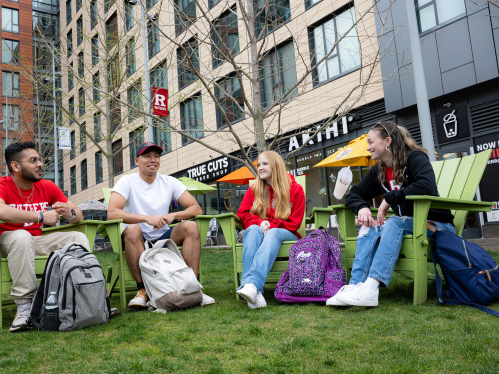 Rutgers student sit and relax at The Yard on College Avenue campus