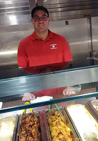 Zachary serving diners at Neilson Dining Hall