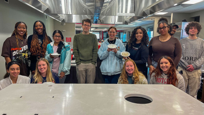   Student teams proudly display the results of the “merengue challenge,” a lesson in the Physics of Cooking class at Rutgers–Camden