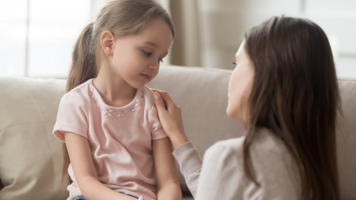 Stock of parent comforting child