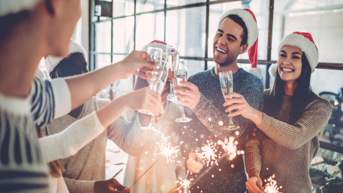 People toasting at holiday party