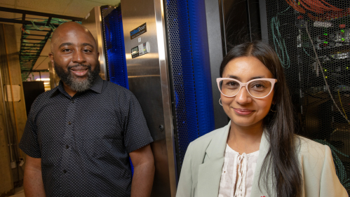 Shikshya Adhikari, Research Associate at CAWP and Travis Williams, Senior Scientist at OARC, amidst the Amarel supercomputer cluster