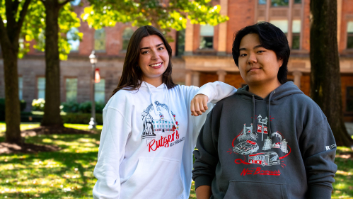 Students on campus wearing Rutgers merchandise