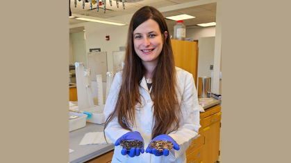 Judit holding beetles