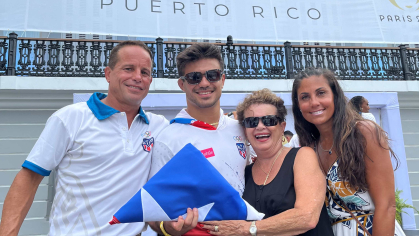 Sebastian Rivera, second from left, celebrates his selection as Puerto Rico's Olympic flag-bearer with his father, Stephen; his grandmother, Gloria; and his mother, Melissa.