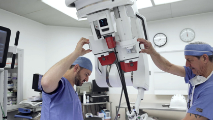 Doctors demonstrate surgical robot