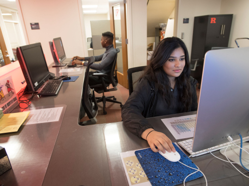 Rutgers SCI students work at the OIT help desk