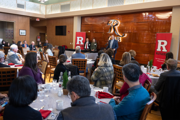 President Holloway speaking at the podium at the Presidential Employee Excellence Recognition Program 